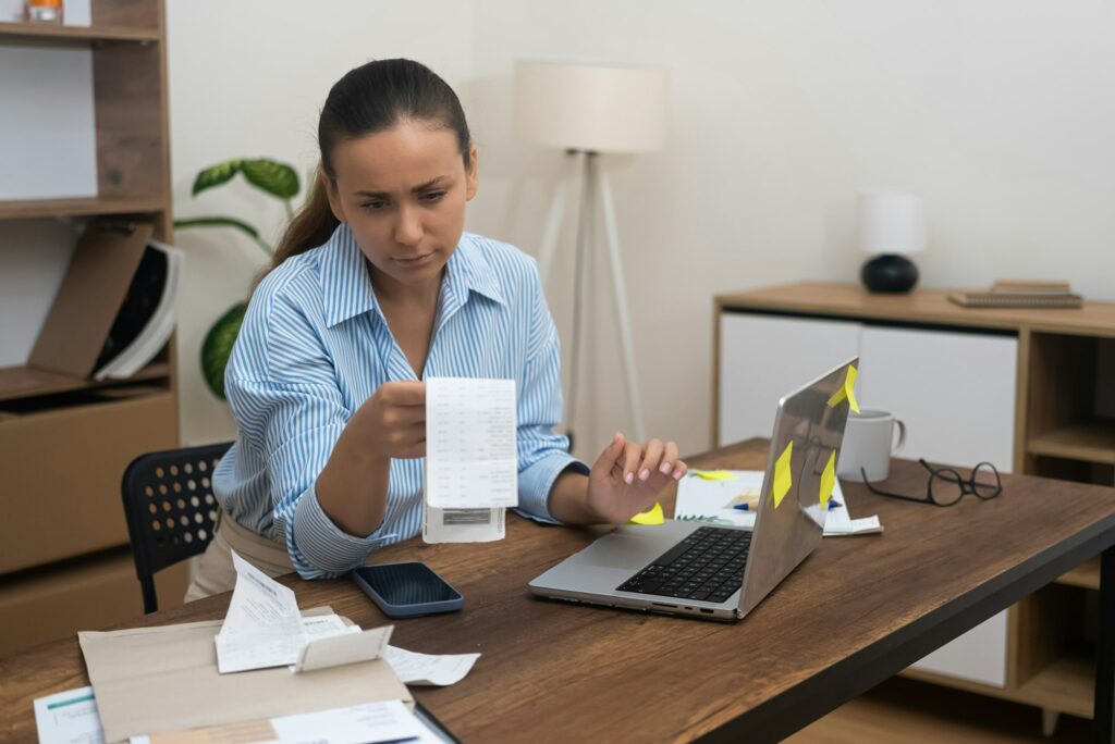 home accountant, bookkeeping, calculates annual finances on calculator, manages tax declarations.